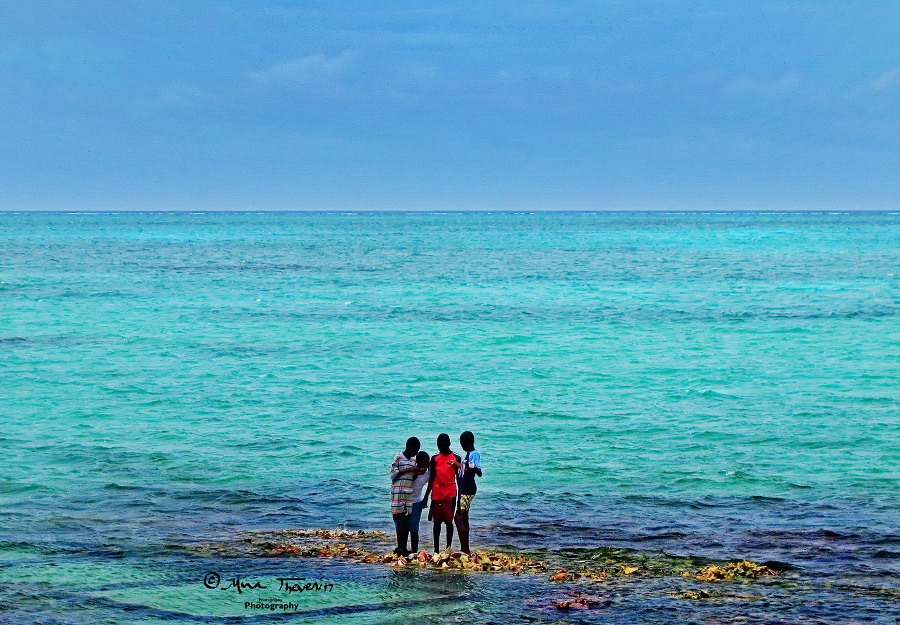 © The Conch Shack. Boys Fishing on TCI by Mina Thevenin