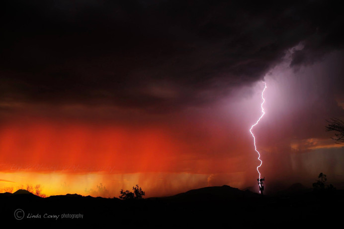 ©DUST STORM & LIGHTNING STRIKE. Photograph by Linda Covey, Arizona